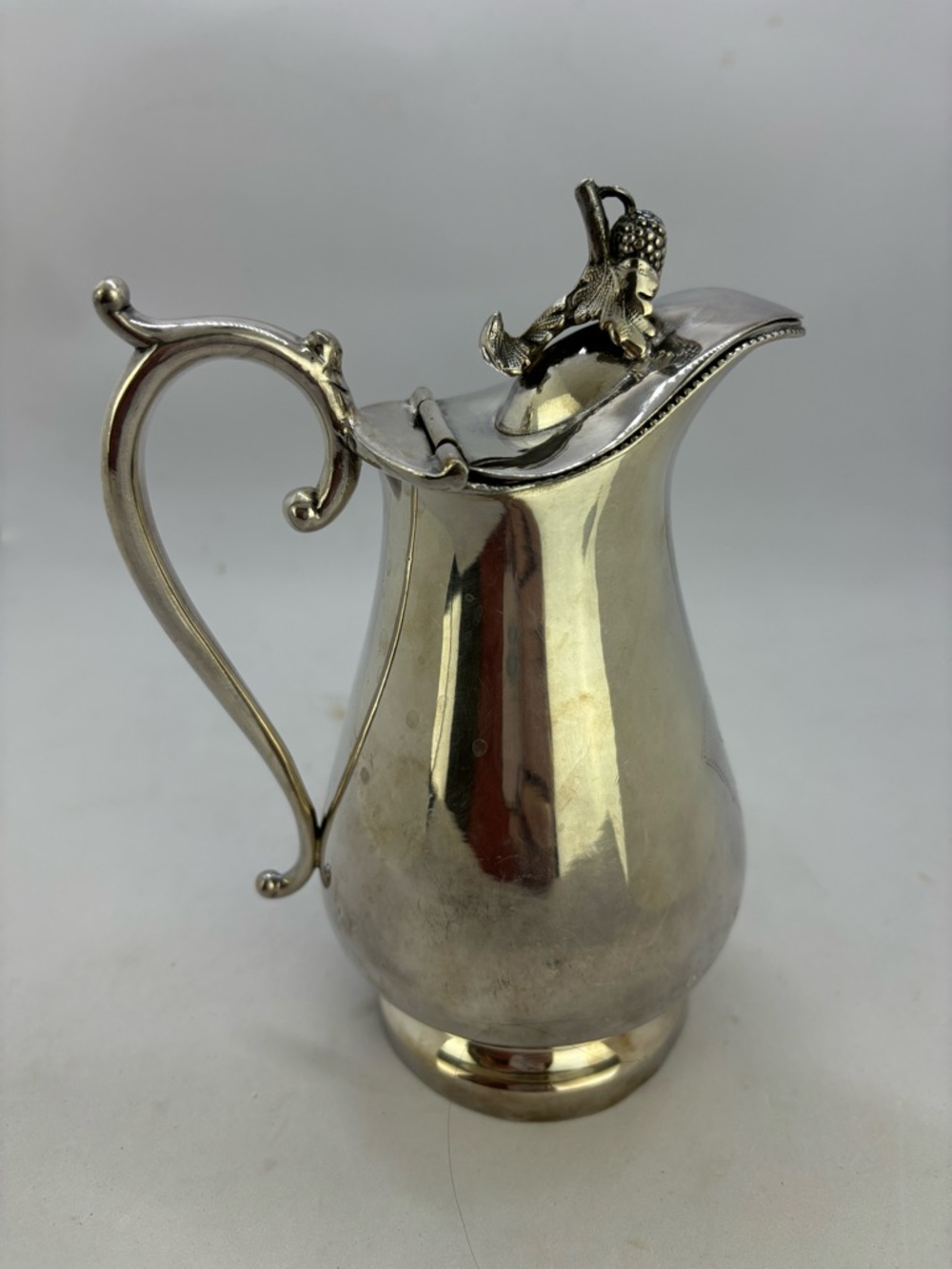 Vintage silver-plated small pitcher/creamer with ornate berry/leaf top